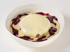 Berry Cloud soufflé pancake with caramelised labneh cream and seasonal berry compote at Cafe Route