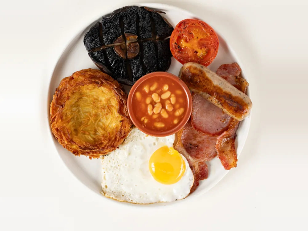 Route English Breakfast with Cumberland sausage, bacon, fried egg, hash nest, mushroom and beans