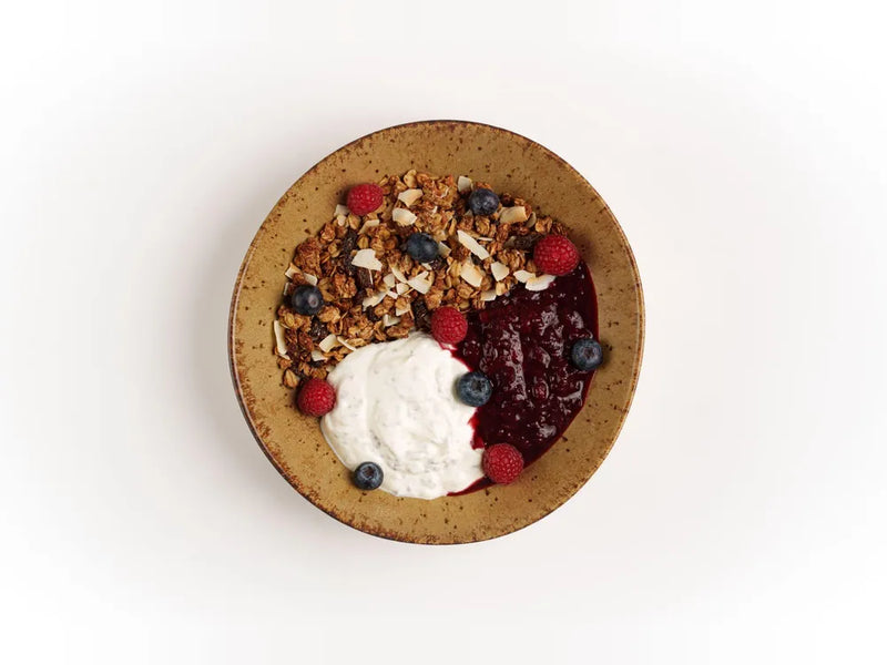 House granola with Greek yoghurt, fresh berries, compote and honey at Cafe Route