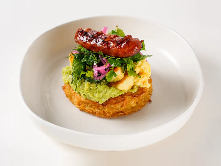 Medi Stack on a Route nest with halloumi, scrambled egg, sucuk, avocado and pickled onion