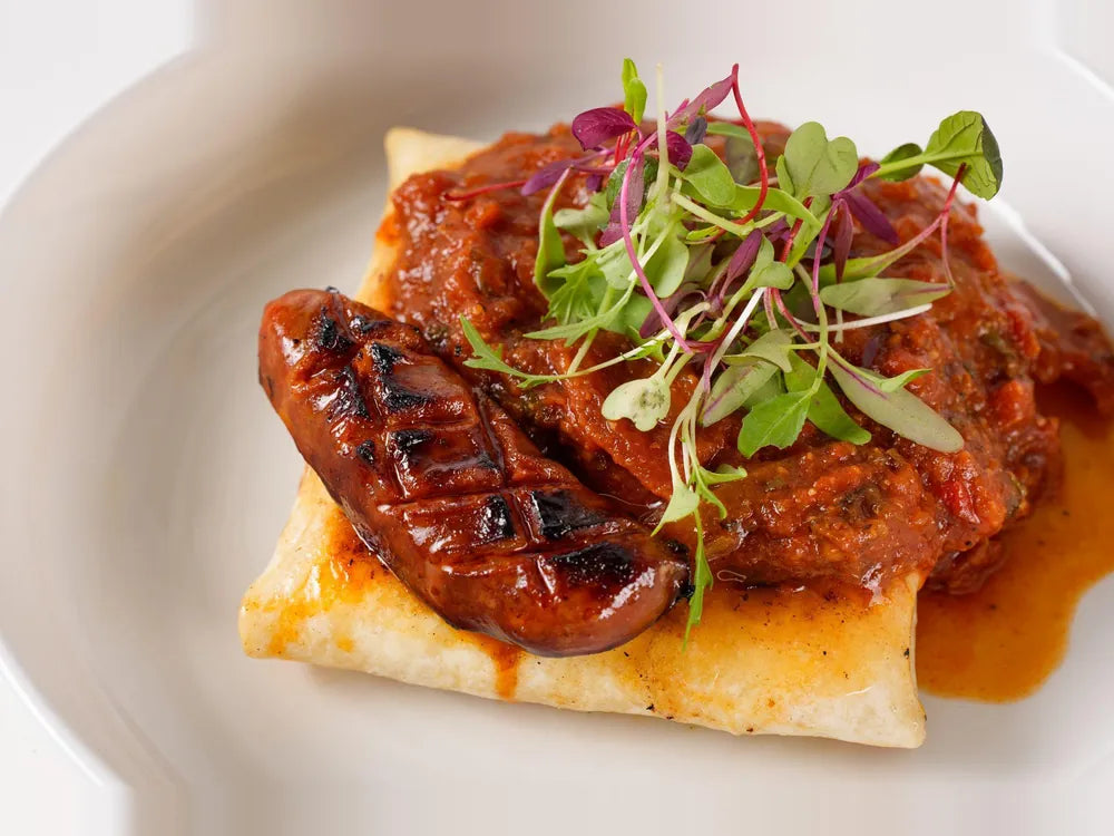 The Hangover folded tortilla with scrambled eggs, shakshuka and grilled sausage at Cafe Route